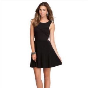 Bebe black mesh dress with side cut out